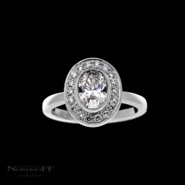 Oval Diamond Engagement Ring with Grain Set Halo